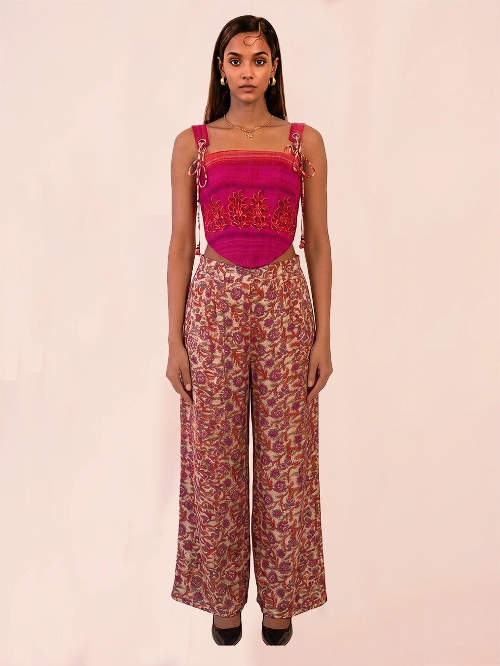NIA PANTS are our one of a kind pants, crafted in-house from printed pure silk.