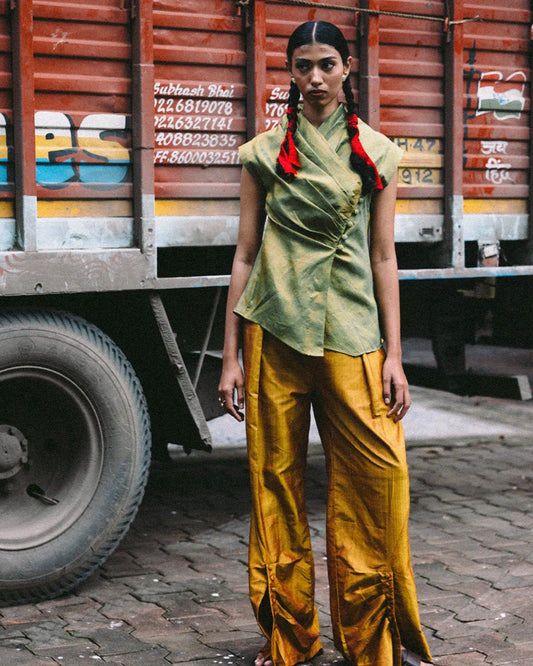 Nivah wide draped trousers gathered at hem for graceful, fluid movement.