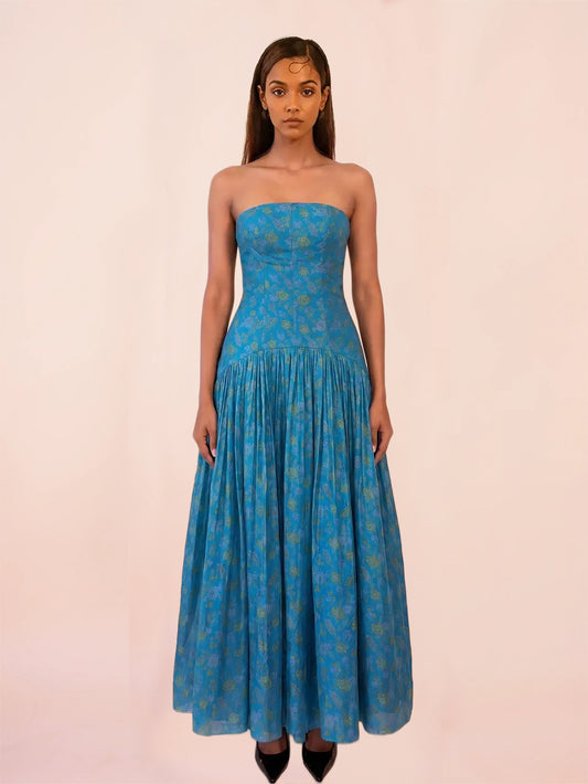 NOOR IV is our one-of-a-kind orange printed silk drop-waist dress, handcrafted by skilled artisans in-house using a one-of-a-kind vintage silk saree