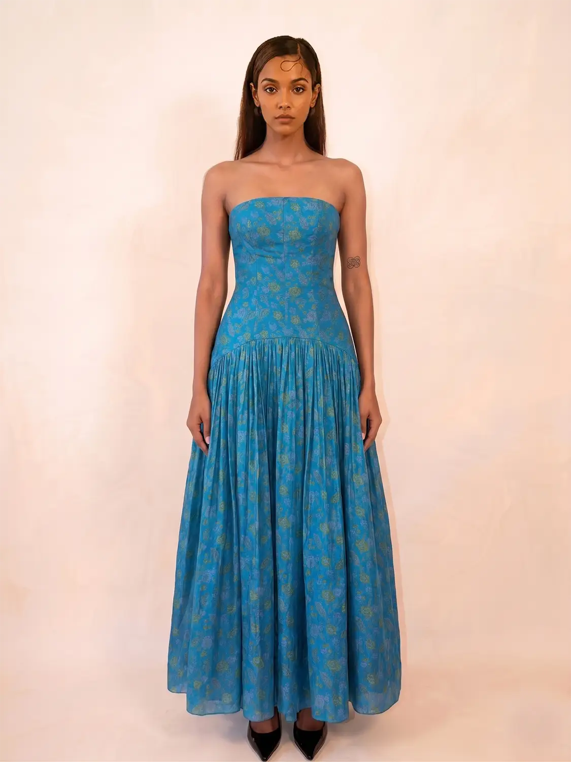 NOOR IV is our one-of-a-kind orange printed silk drop-waist dress
