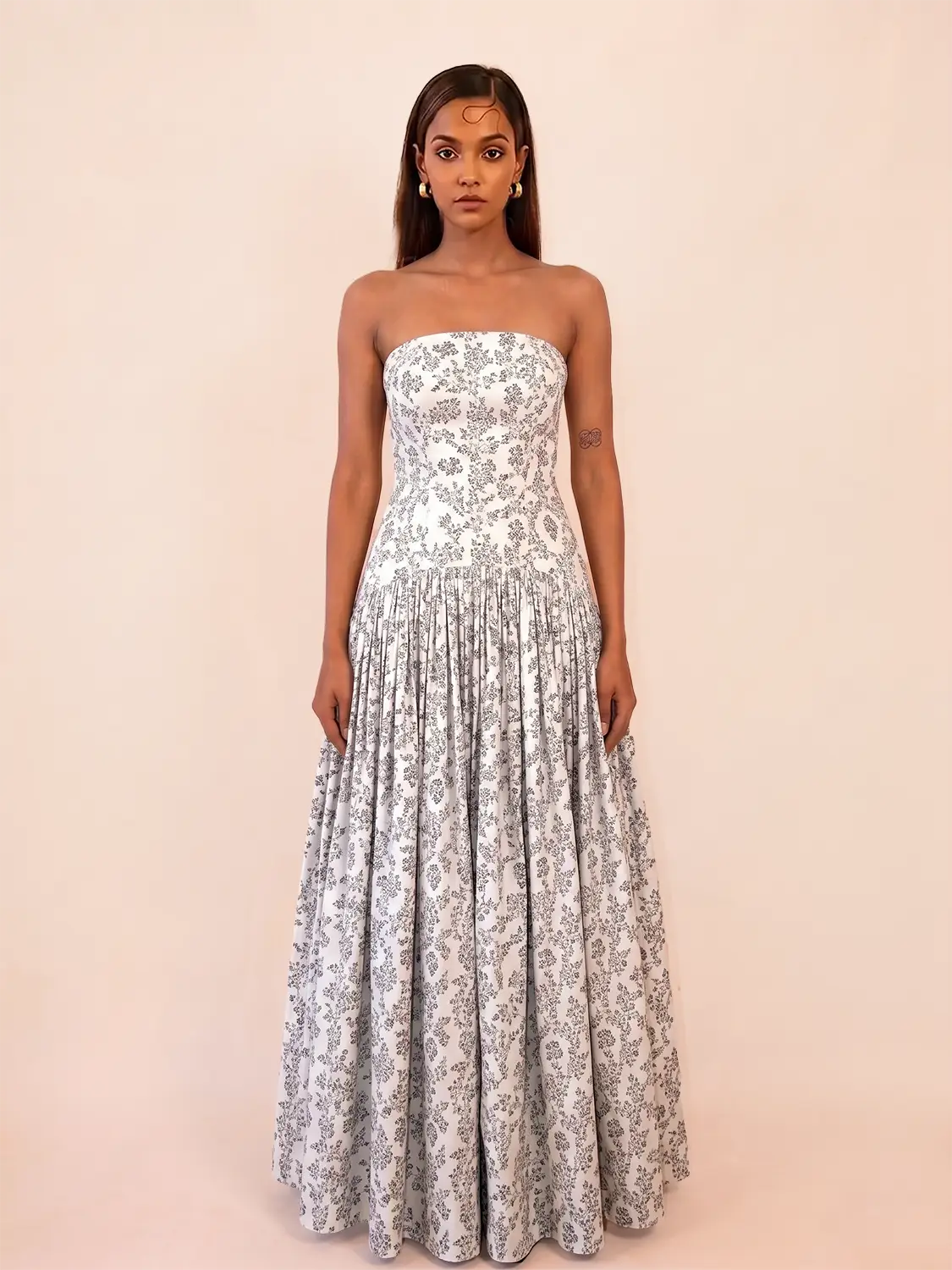 NOOR I is our one-of-a-kind printed silk drop-waist dress, handcrafted by skilled artisans in-house using a one-of-a-kind vintage silk saree.