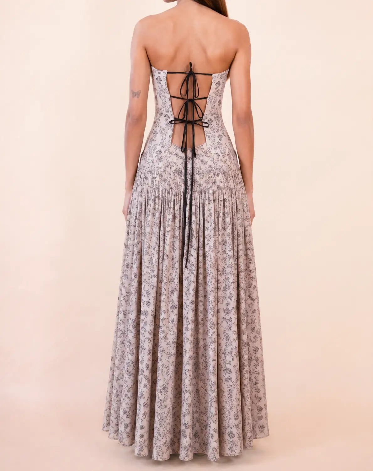 NOOR I is our one-of-a-kind printed silk drop-waist dress, handcrafted by skilled artisans in-house using a one-of-a-kind vintage silk saree.