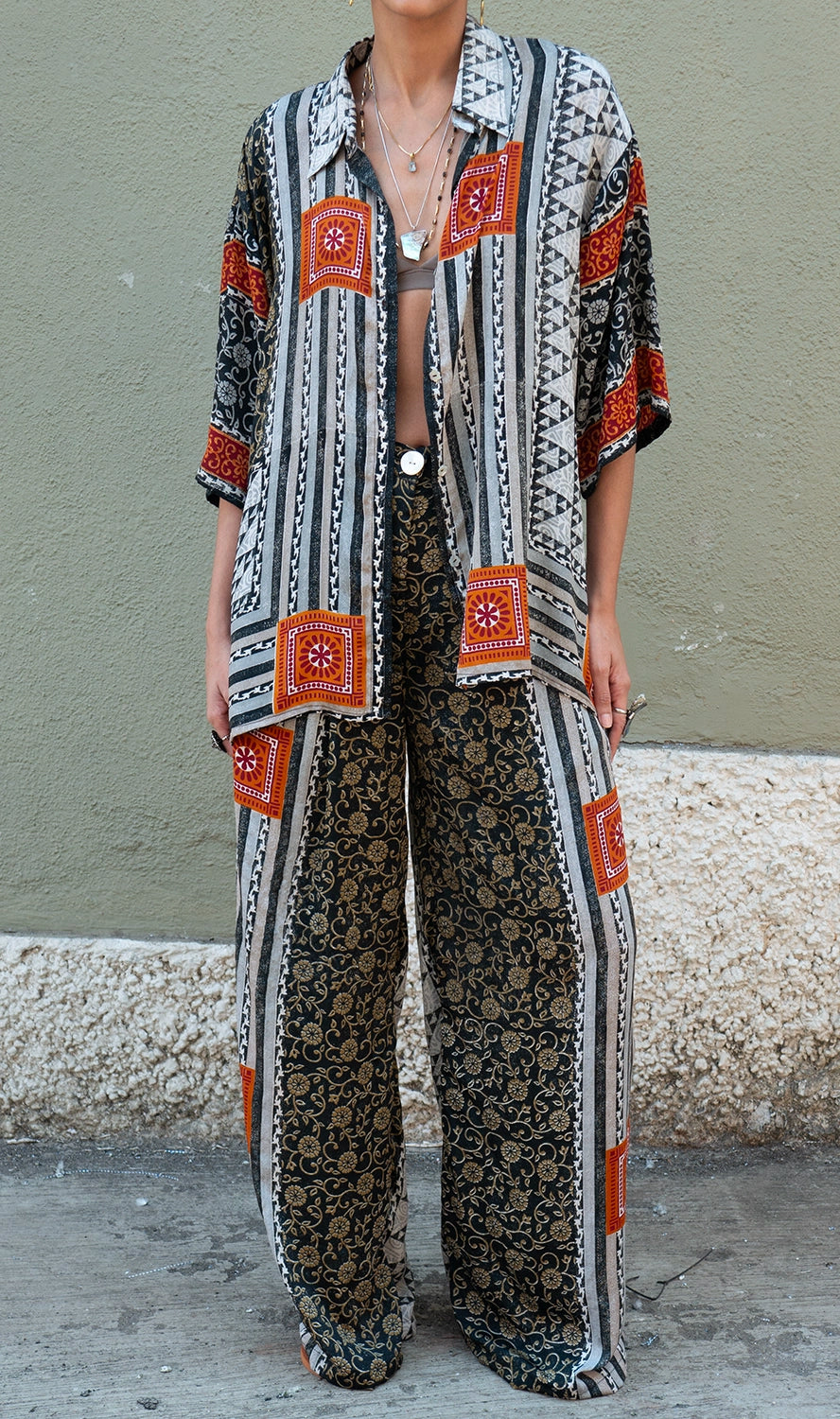 OJAS SHIRT is our one of a kind oversized printed silk shirt, handcrafted by skilled artisans in house using a vintage silk saree.