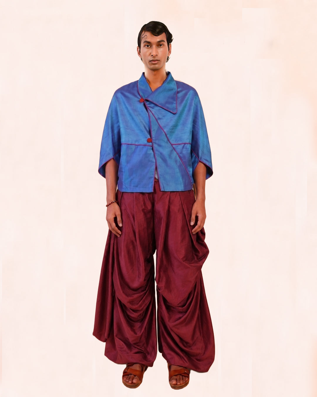 PATANG TOP is our one-of-a-kind top, handcrafted in-house from a single square of fabric, folded seamlessly into form without any cuts or waste. 