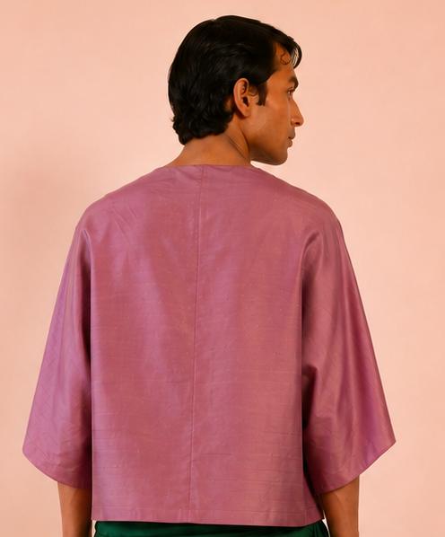 PATANG TOP is our one-of-a-kind top, handcrafted in-house from a single square of fabric, folded seamlessly into form without any cuts or waste. 