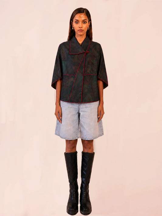 PATANG TOP is our one-of-a-kind top, handcrafted in-house from a single square of fabric, folded seamlessly into form without any cuts or waste.