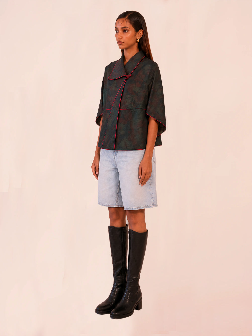 PATANG TOP is our one-of-a-kind top, handcrafted in-house from a single square of fabric, folded seamlessly into form without any cuts or waste.