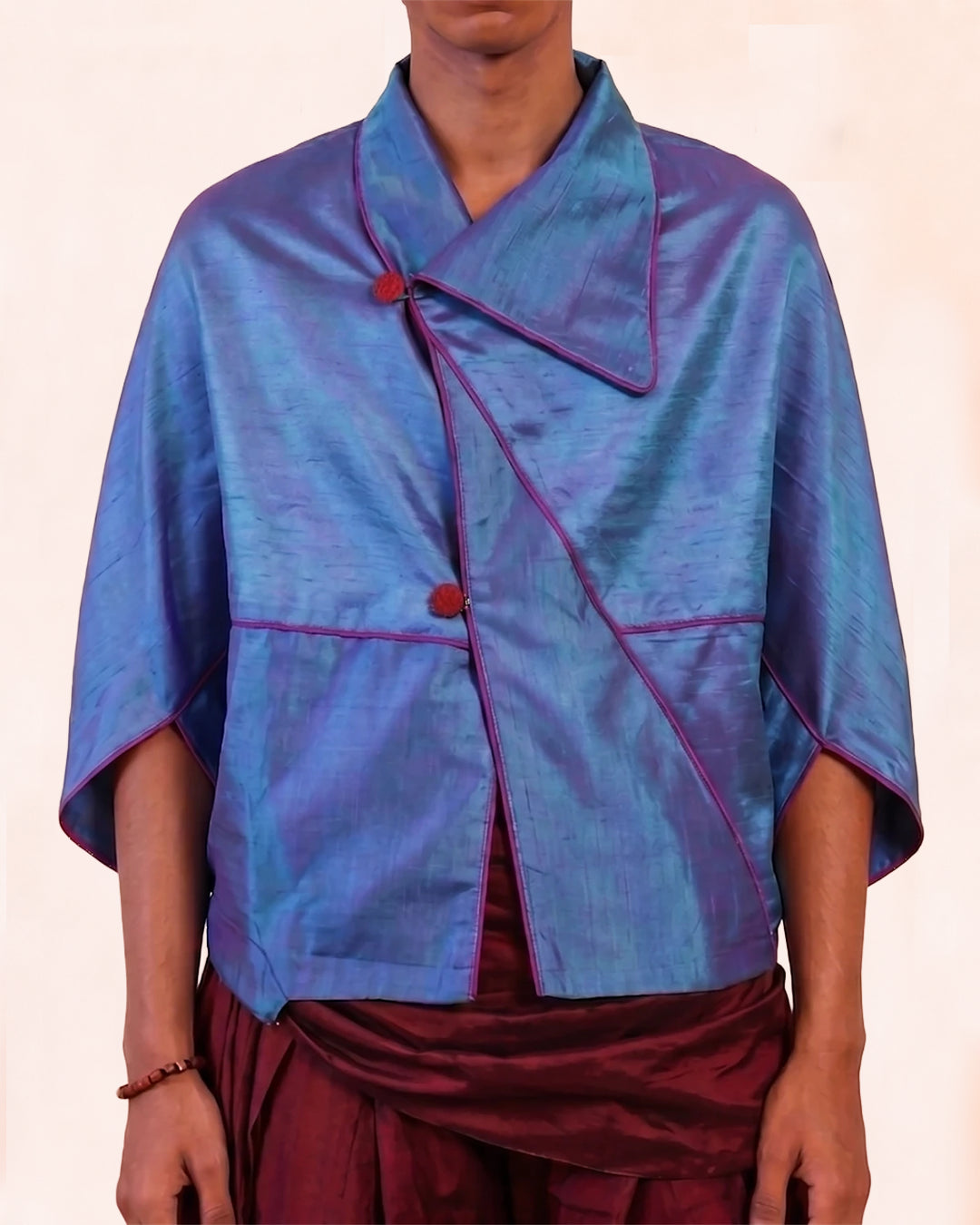 PATANG TOP is our one-of-a-kind top, handcrafted in-house from a single square of fabric, folded seamlessly into form without any cuts or waste. 