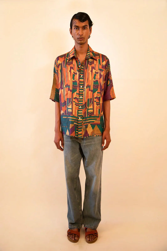 Upcycled vintage cotton shirt featuring a bold multicoloured abstract print, handcrafted with a focus on slow fashion, circular design, and artisanal heritage