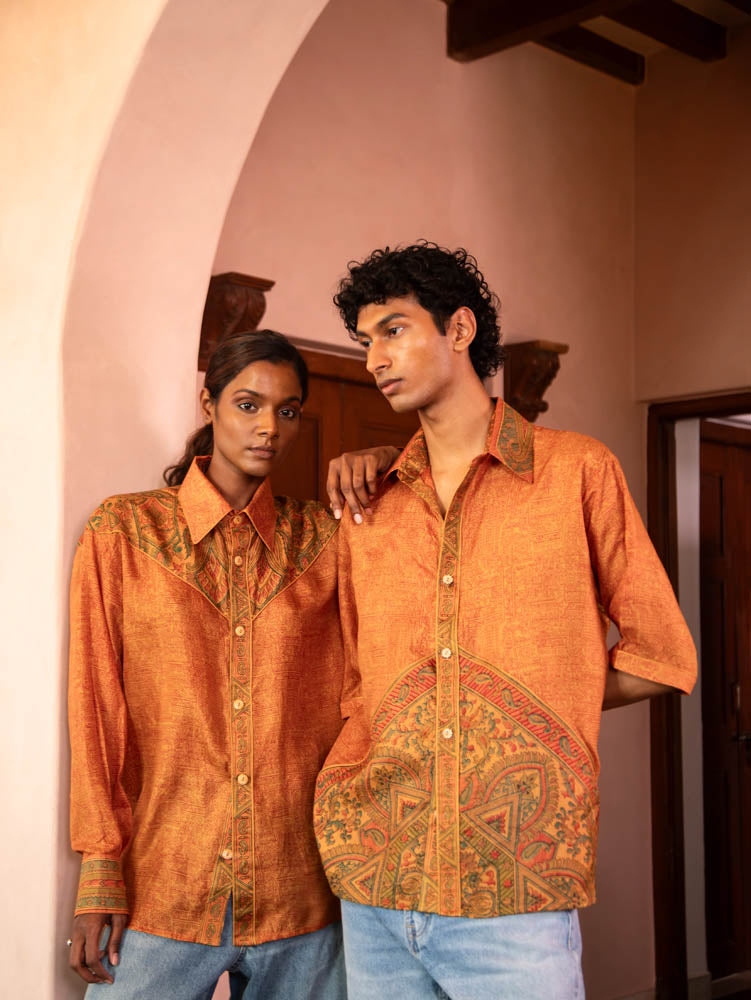 LAVYA vintage full-sleeve shirt in bold orange print with detailed collar and button placket, relaxed fit breathable fabric for effortless movement.