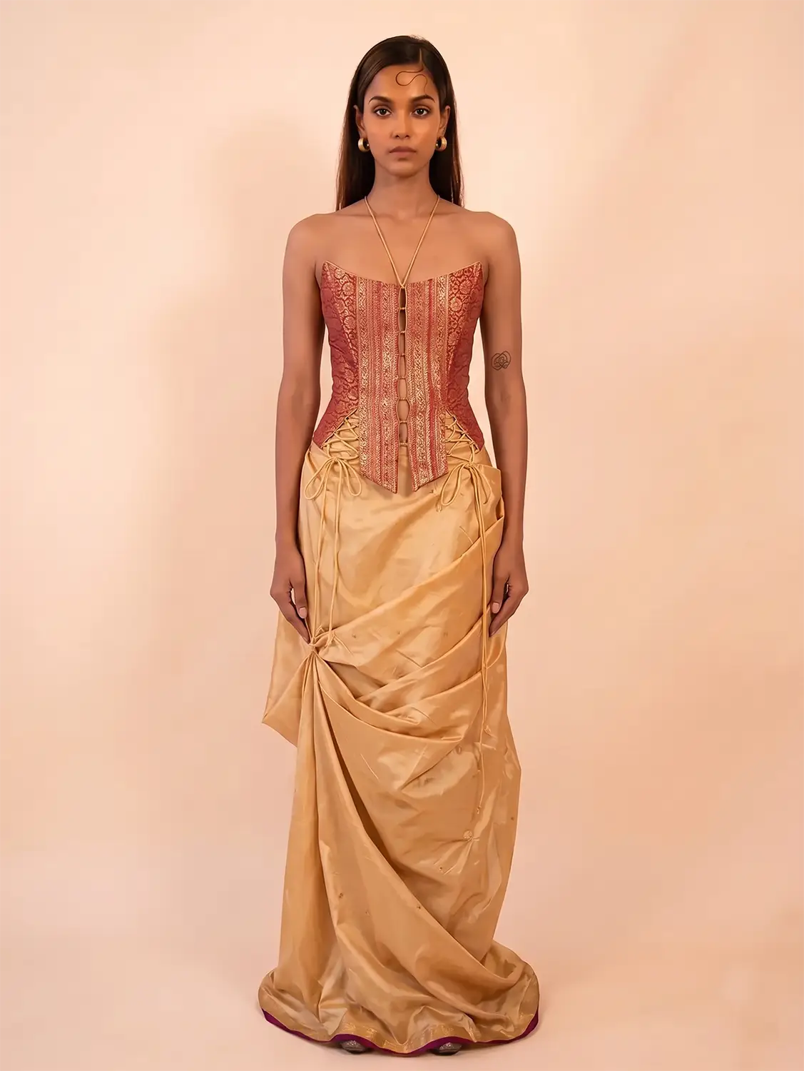 Raina is our one-of-a-kind four-panel corset, handcrafted in-house using a vintage silk saree.