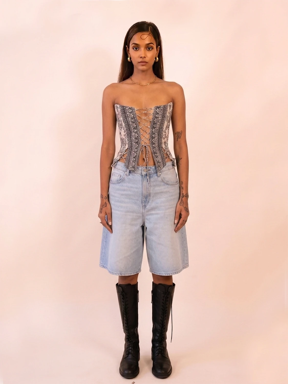 RAINA is our one-of-a-kind four-panel corset, handcrafted in-house using a vintage silk saree.