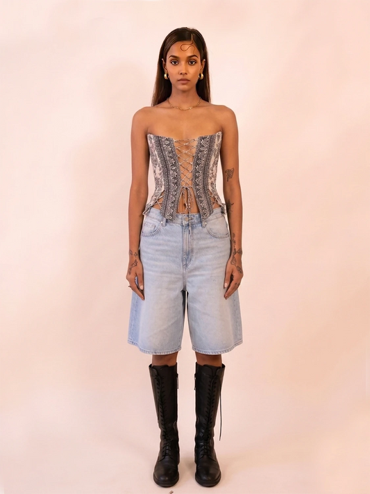 RAINA is our one-of-a-kind four-panel corset, handcrafted in-house using a vintage silk saree.