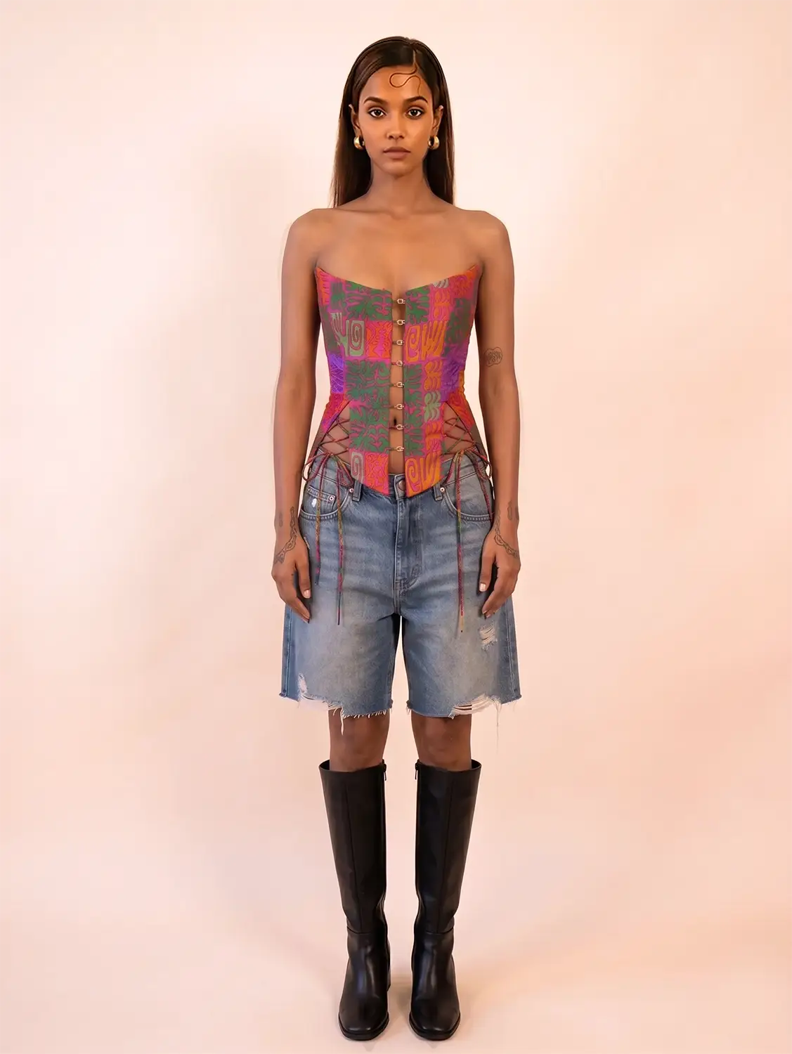RAINA is our one-of-a-kind four-panel corset, handcrafted in-house using a vintage silk saree. 