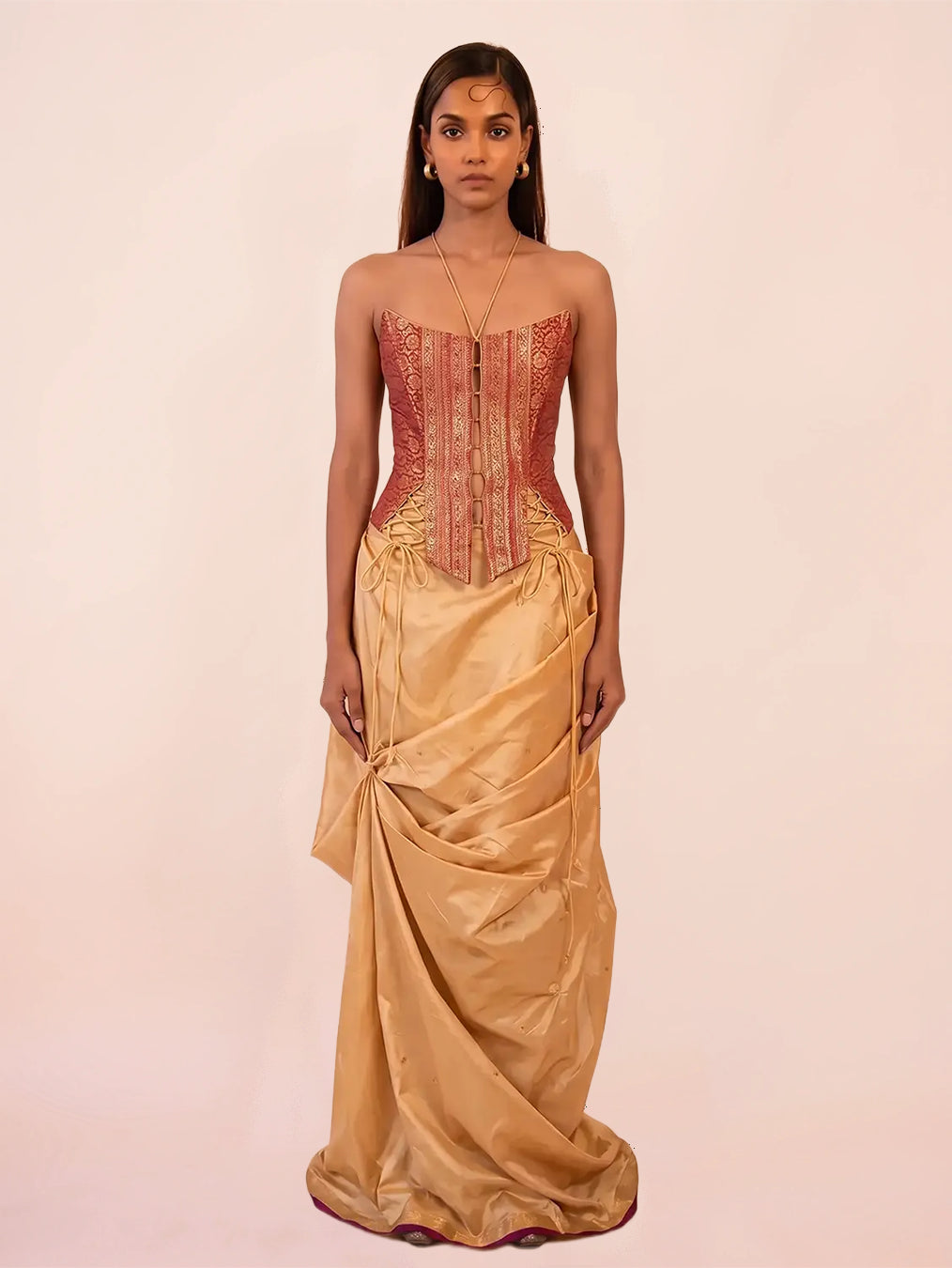 Raina is our one-of-a-kind four-panel corset, handcrafted in-house using a vintage silk saree. 