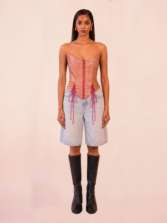 RAINA is our one-of-a-kind four-panel corset, handcrafted in-house using a vintage silk saree.