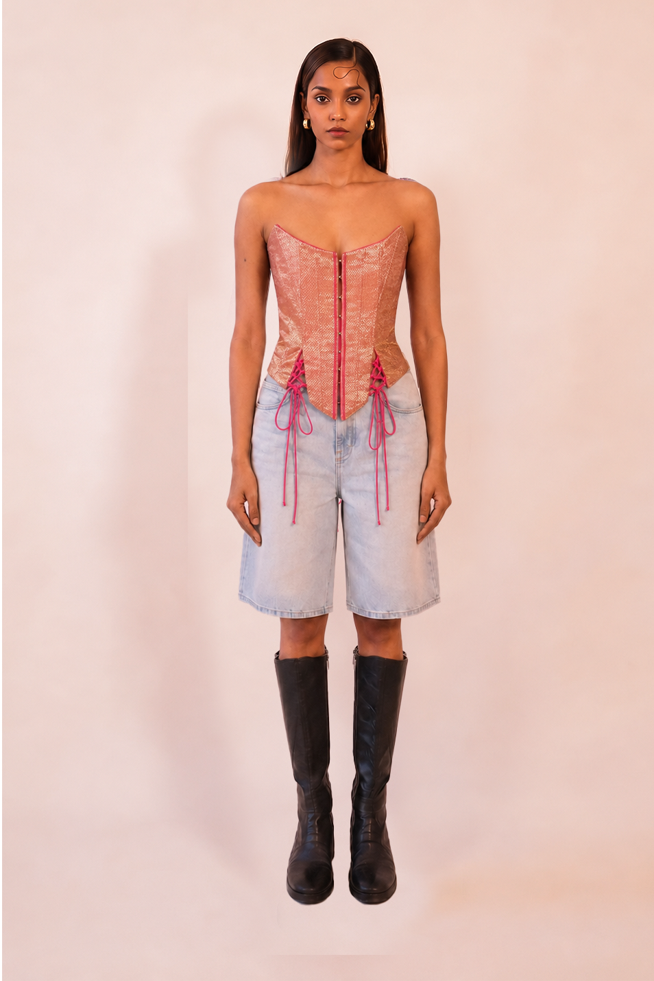RAINA is our one-of-a-kind four-panel corset, handcrafted in-house using a vintage silk saree.