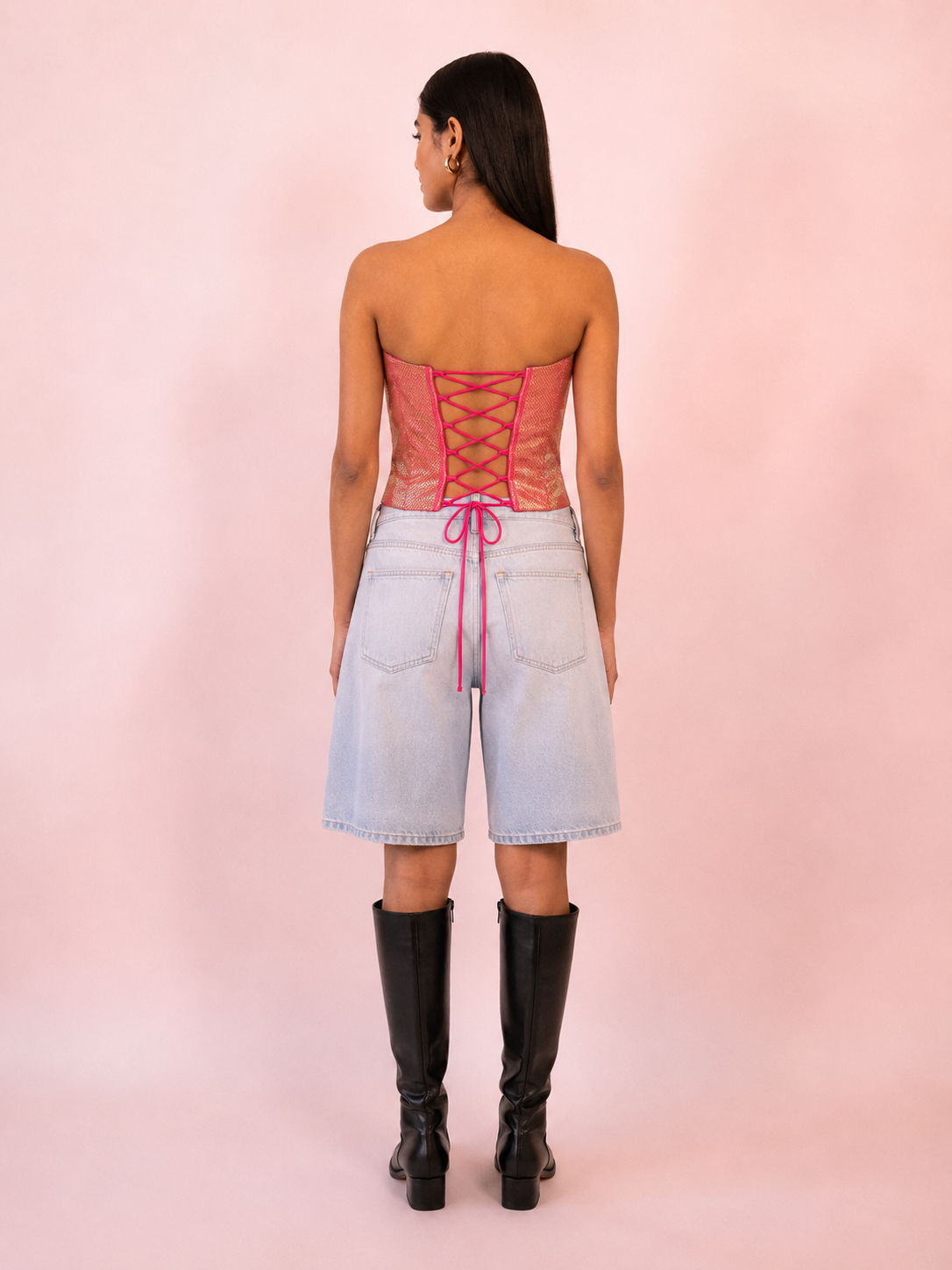 RAINA is our one-of-a-kind four-panel corset, handcrafted in-house using a vintage silk saree.