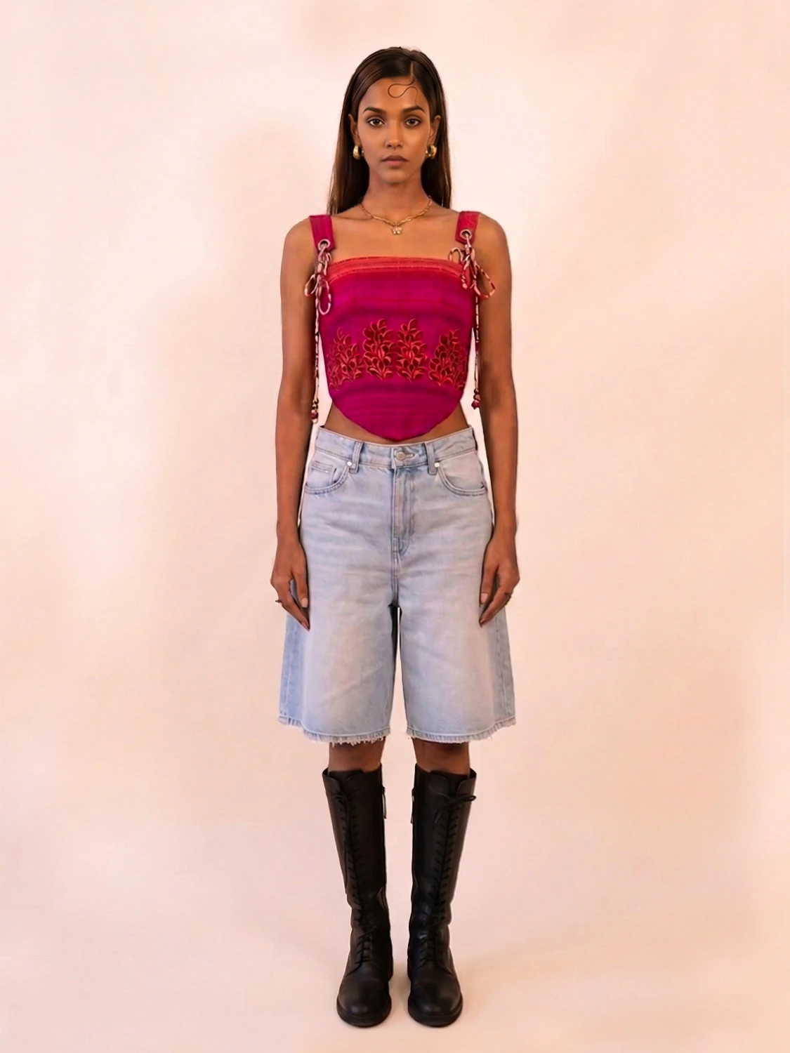 RAYA is our one-of-a-kind printed silk corset with delicate shoulder straps, handcrafted by skilled artisans in-house using a vintage silk saree. 