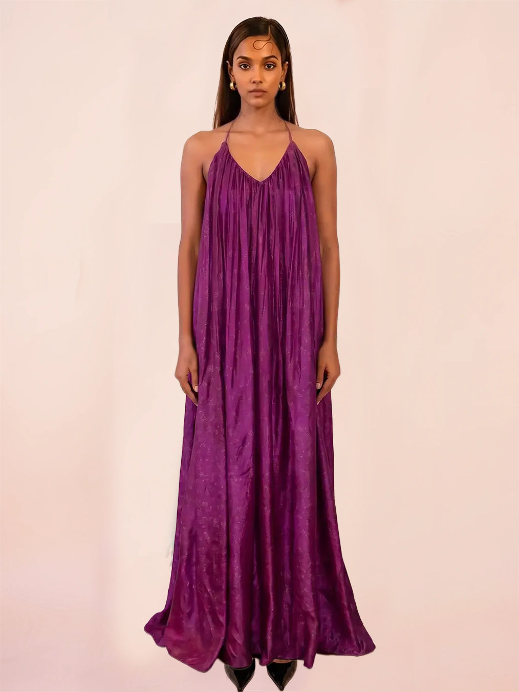 SAHIBA is our one-of-a-kind deep V backless dori dress, handcrafted by skilled artisans in-house using a one-of-a-kind vintage silk saree. 