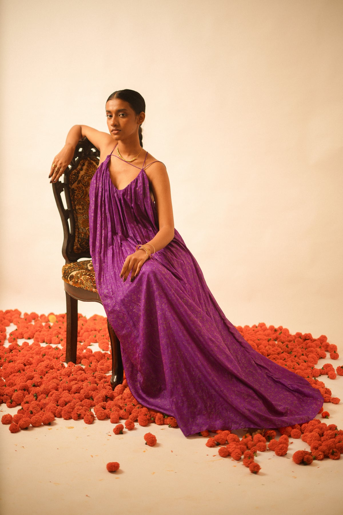 SAHIBA is our one-of-a-kind deep V backless dori dress, handcrafted by skilled artisans in-house using a one-of-a-kind vintage silk saree. 