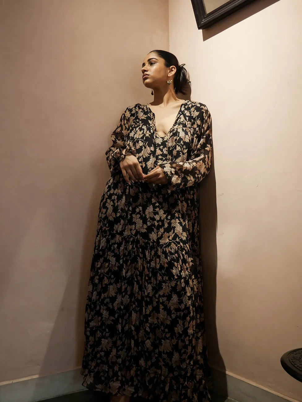 SAIA, our one-of-a-kind maxi dress made in-house using a vintage silk saree. This garment features a flowy silhouette with a versatile neckline that can be worn deep V or tied with delicate strings for a closed, modest look