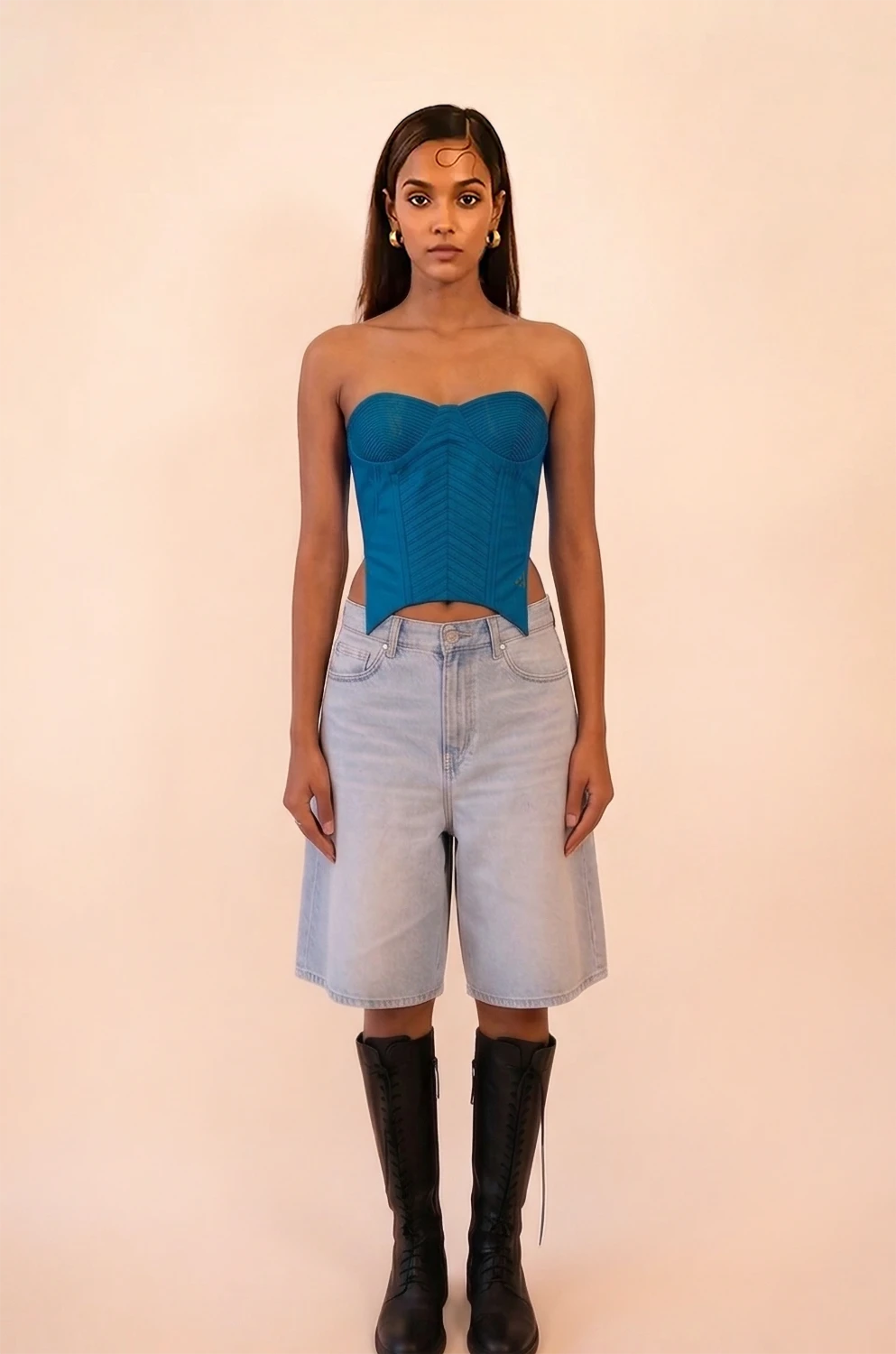 VANA is our one-of-a-kind blue silk corset, handcrafted in-house using a vintage silk saree.