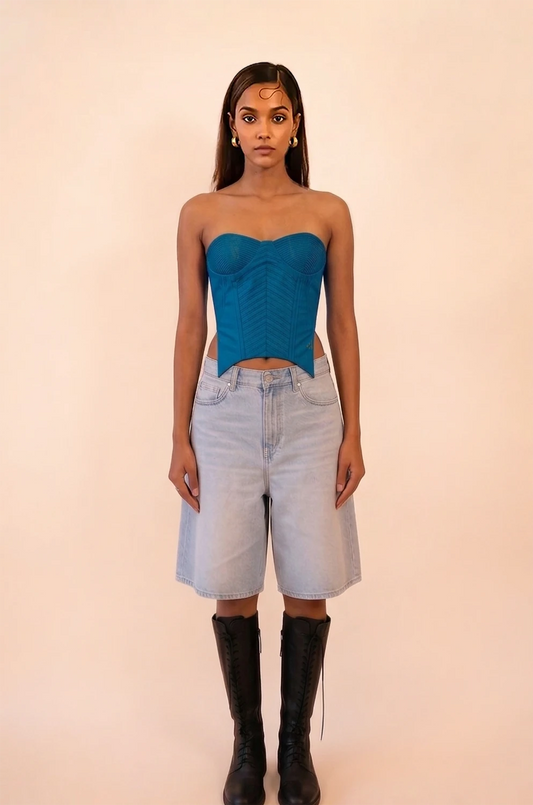 VANA is our one-of-a-kind blue silk corset, handcrafted in-house using a vintage silk saree.