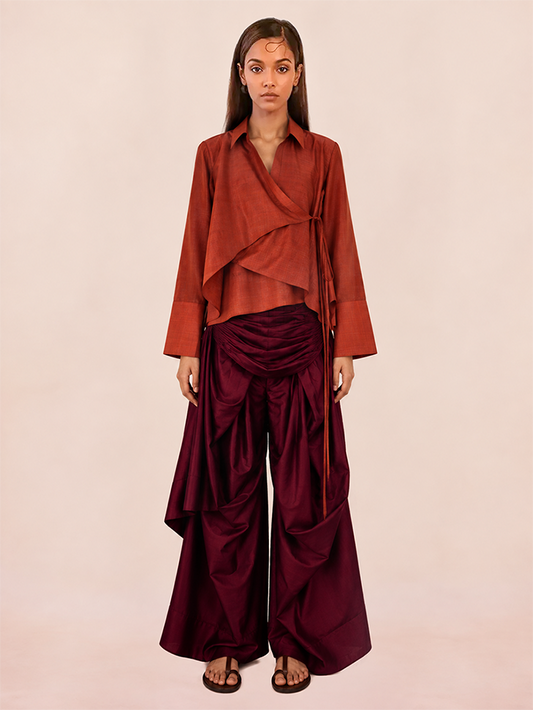 VASTRAM is our one-of-a-kind loose-fitting outer tunic, handcrafted in-house with a layered