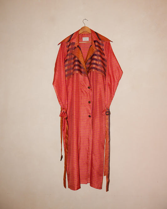 Lightweight, versatile, and full of character, this trench coat is a true celebration of heritage craft, conscious making, and enduring style—a statement layer that moves seamlessly from day to evening.