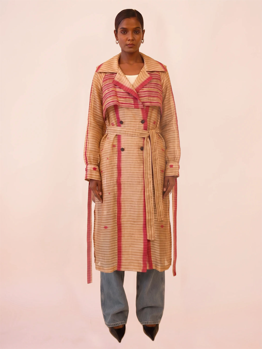 VEDYA IX is our one-of-a-kind pink and white silk trench coat, handcrafted in-house using a vintage silk saree. 