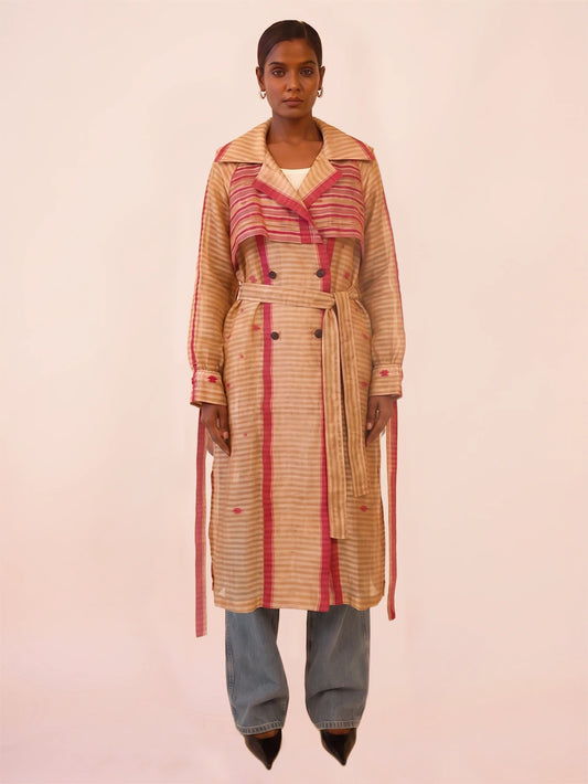 VEDYA IX is our one-of-a-kind pink and white silk trench coat, handcrafted in-house using a vintage silk saree. 