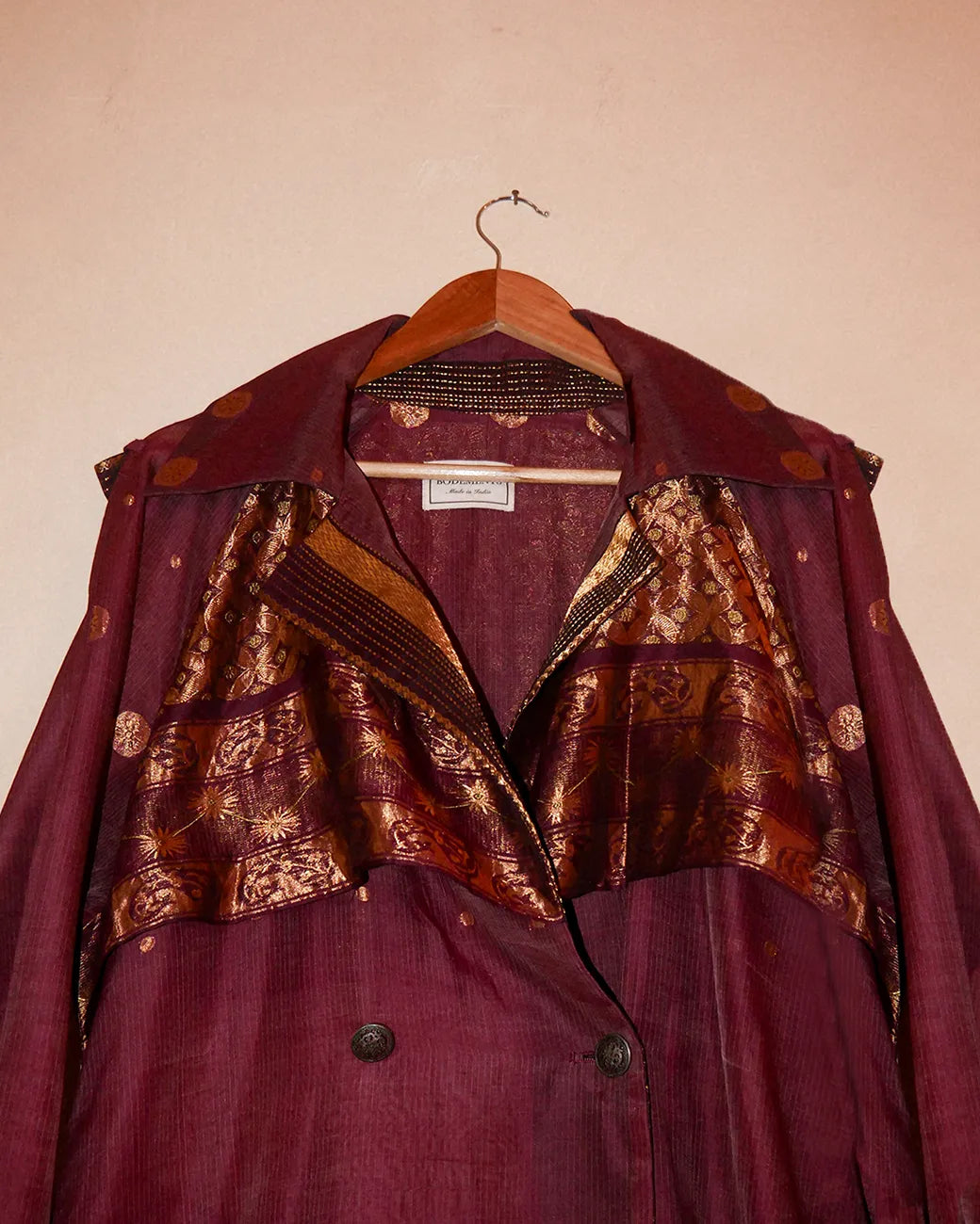 Vedya Maroon checkered silk trench coat handcrafted from South Indian silk with relaxed boxy fit, buckle details on arms and waist