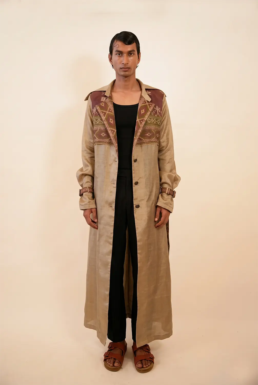 Vedya is our one-of-a-kind off-white silk trench coat, handcrafted by skilled artisans in-house using a one-of-a-kind vintage silk saree.