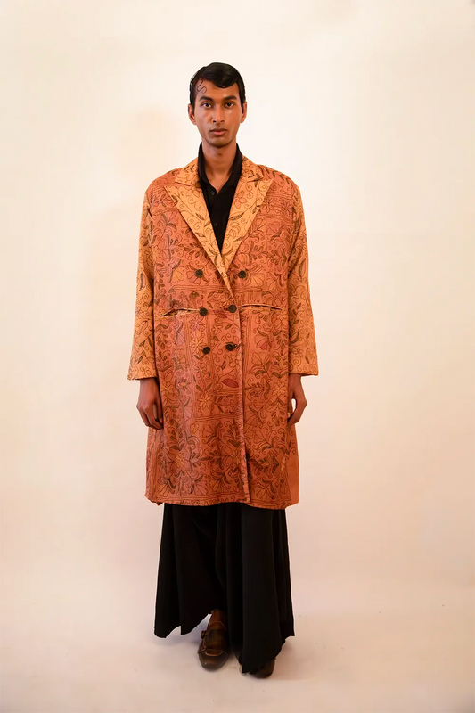 Ved is our one-of-a-kind double-breasted silk trench coat, handcrafted by skilled artisans in-house using a vintage silk sari. 