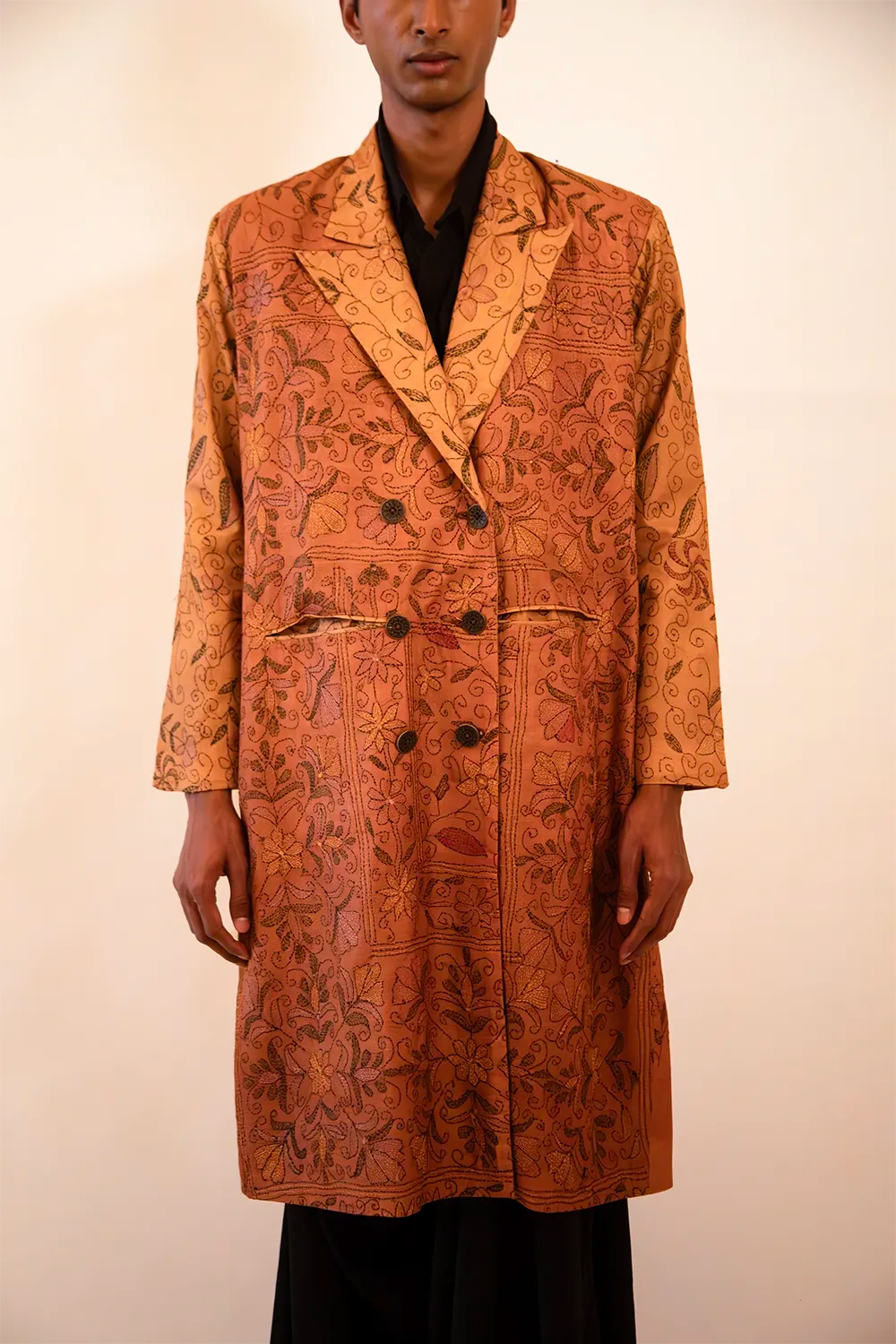 Ved is our one-of-a-kind double-breasted silk trench coat, handcrafted by skilled artisans in-house using a vintage silk sari. 