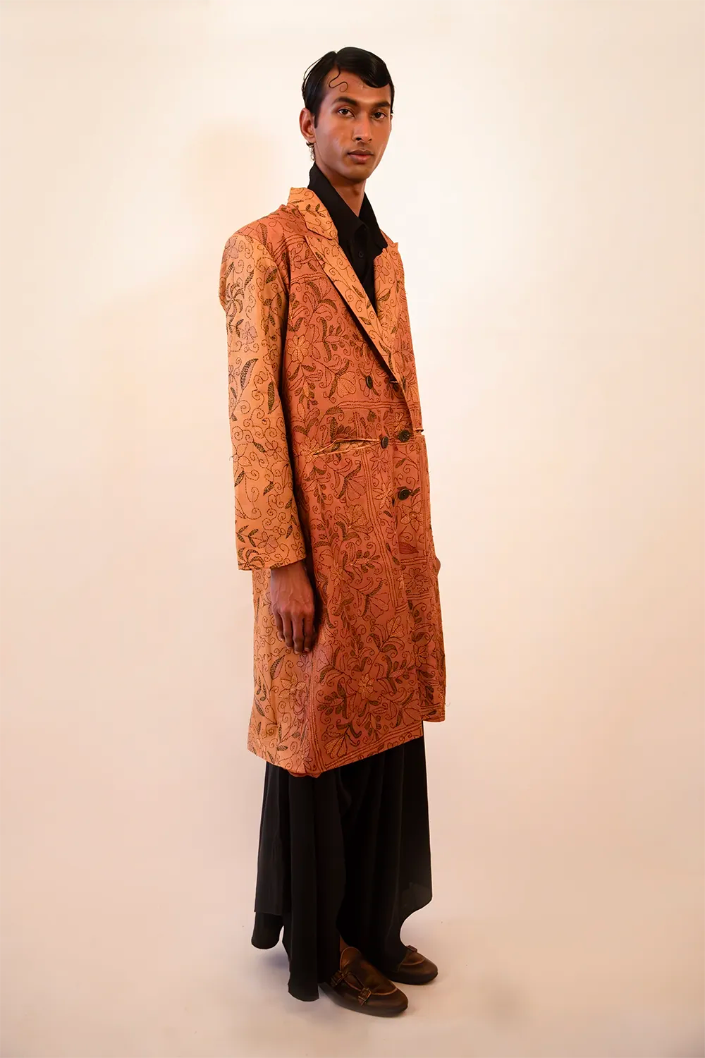 Ved is our one-of-a-kind double-breasted silk trench coat, handcrafted by skilled artisans in-house using a vintage silk sari. 