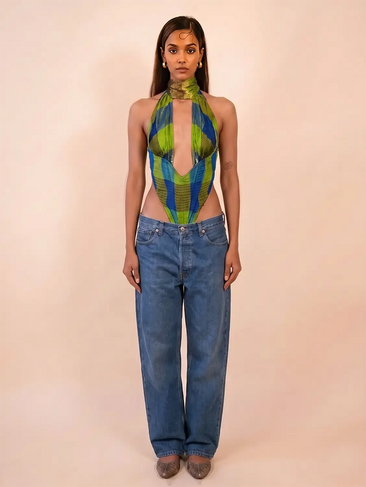 VIVIENNE is our one-of-a-kind printed silk tube corset, handcrafted in-house using a vintage silk saree. 