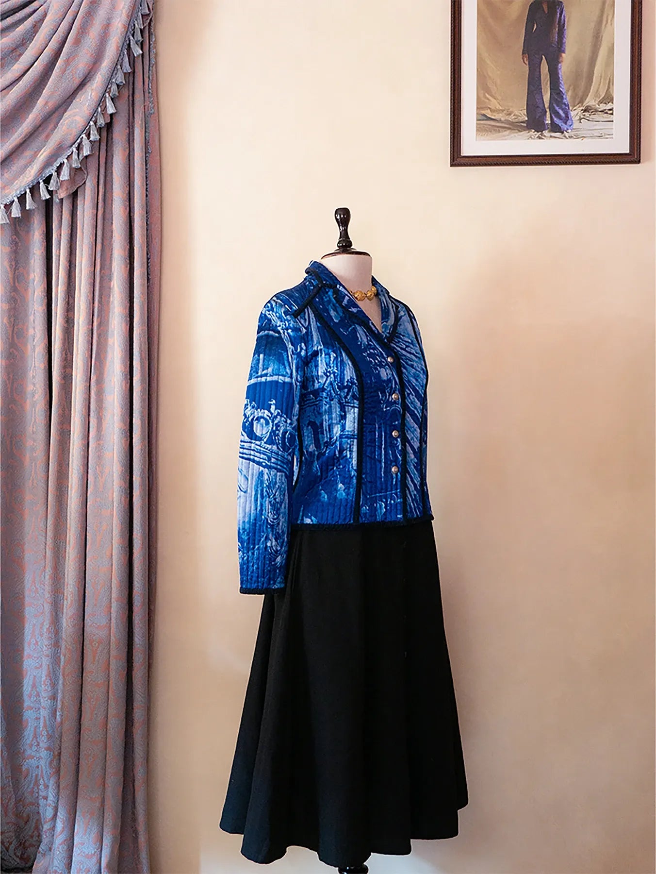 Vintage Gattinoni blue quilted jacket featuring contrast piping and structured tailoring, sourced from global designer archives.