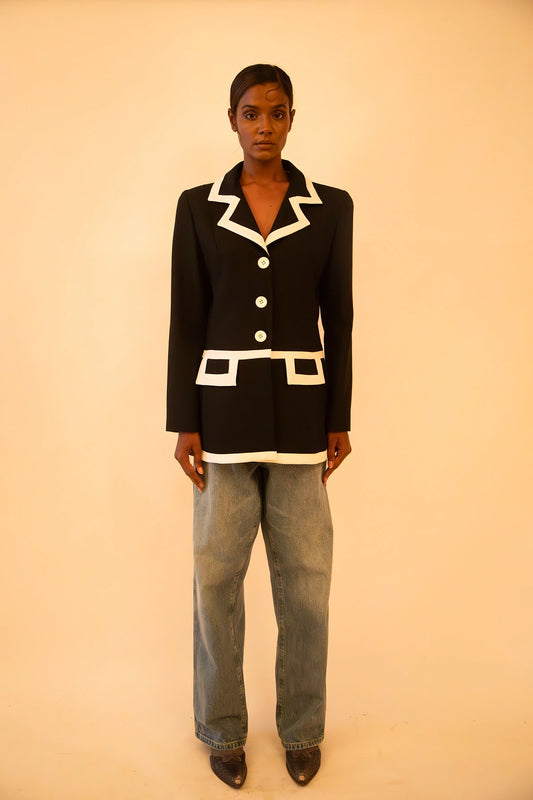 Vintage Sandro black and white fitted blazer featuring sharp tailoring and a classic silhouette, sourced from global designer archives.