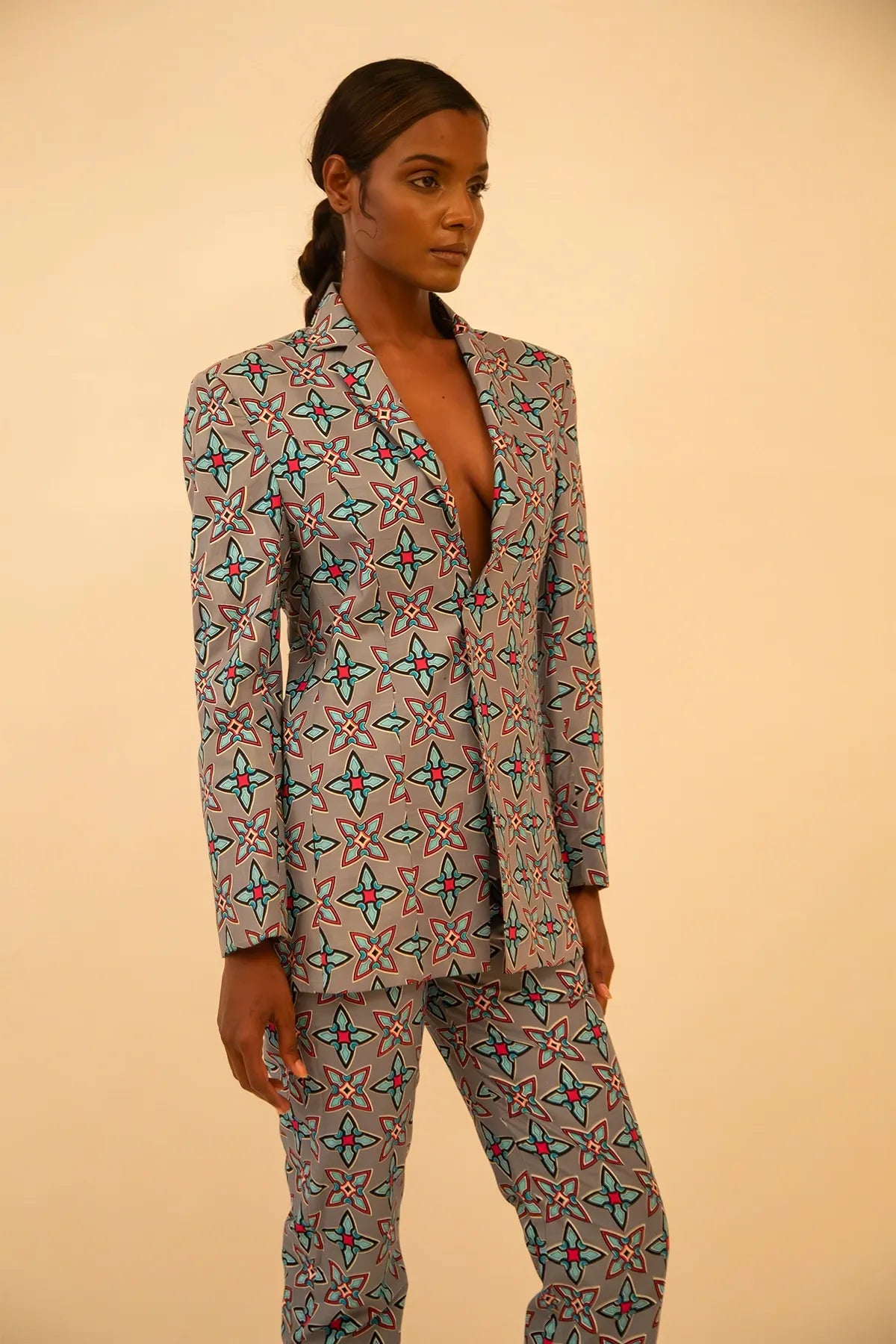 Vintage abstract print oversized blazer and pant set featuring a relaxed fit and bold coordinated design, thrifted from global vintage collections.