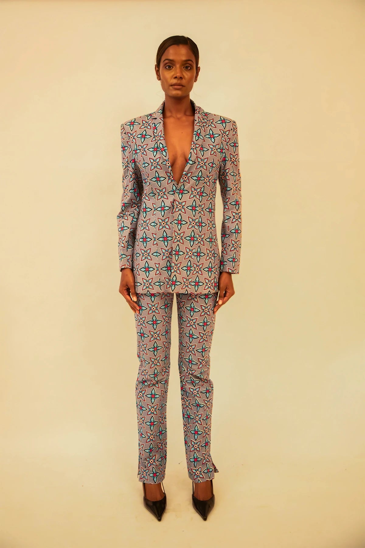 Vintage abstract print oversized blazer and pant set featuring a relaxed fit and bold coordinated design, thrifted from global vintage collections.