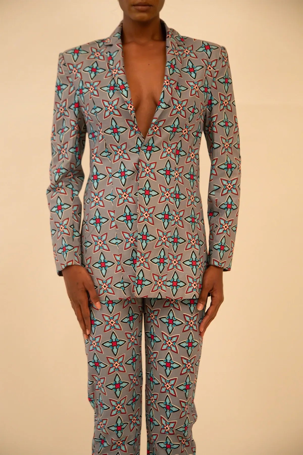 Vintage abstract print oversized blazer and pant set featuring a relaxed fit and bold coordinated design, thrifted from global vintage collections.