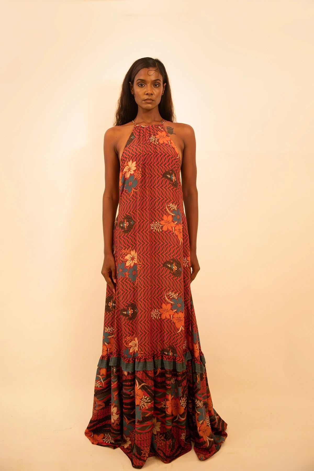 Rust printed silk halter neck backless dress handcrafted from a vintage sari, featuring a delicate lace-up back and versatile fit.