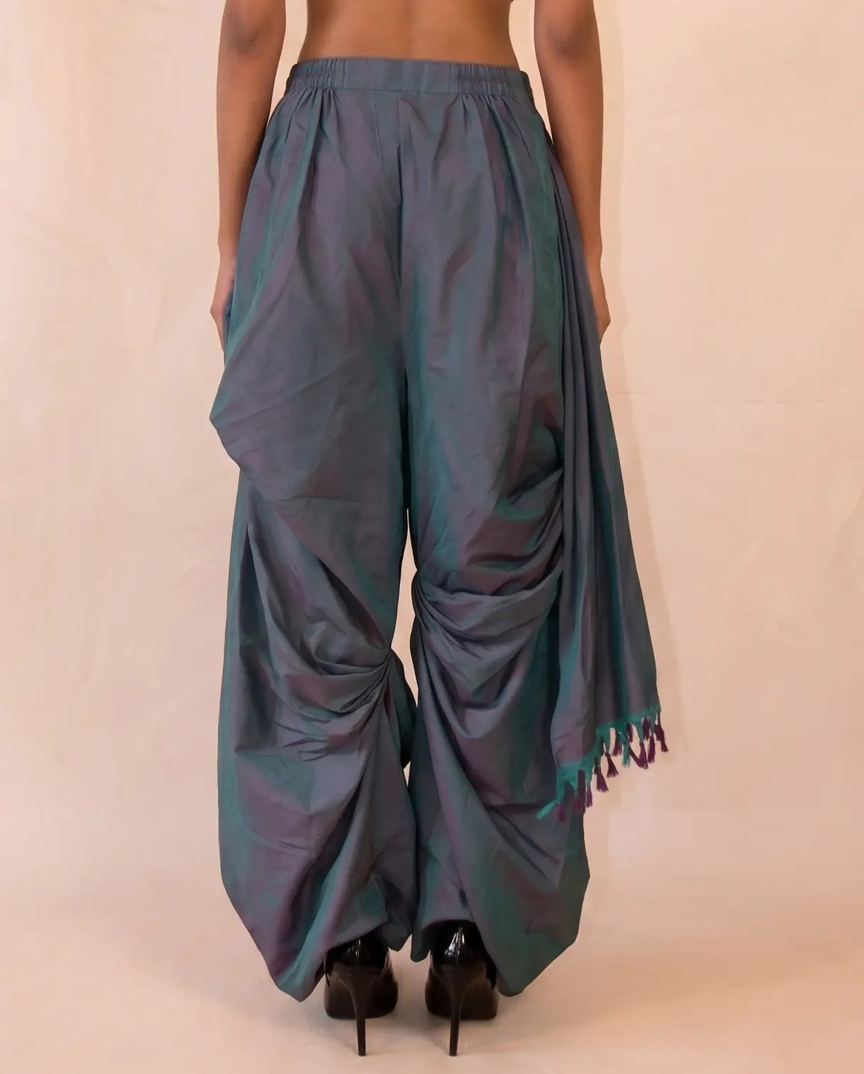 Antariya is a one of a kind drape pant, handcrafted in house from repurposed pure silk and saree borders. 