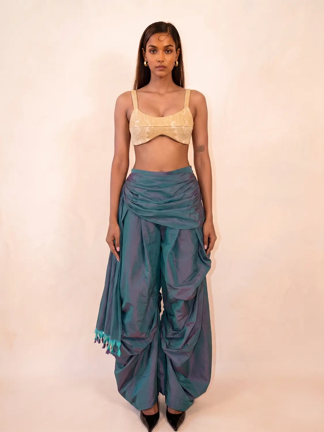 Antariya is a one of a kind drape pant, handcrafted in house from repurposed pure silk and saree borders. 