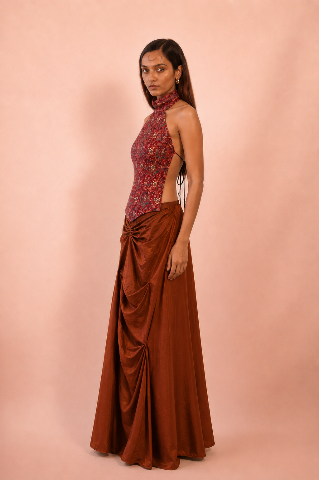 GULJHAAM IX is a one of a kind drape skirt, crafted in house from a vintage silk saree and shaped through intuitive, sculptural draping.
