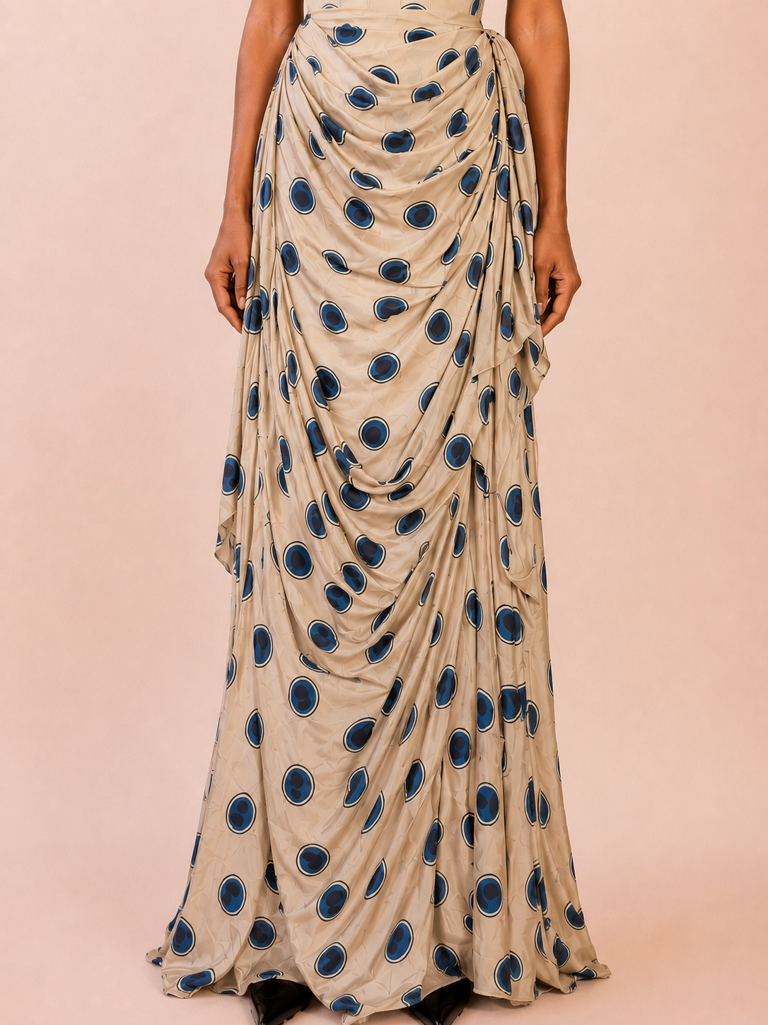INDIGO GULJHAAM is a one of a kind drape skirt, crafted in house from a vintage silk saree and shaped through intuitive, sculptural draping.