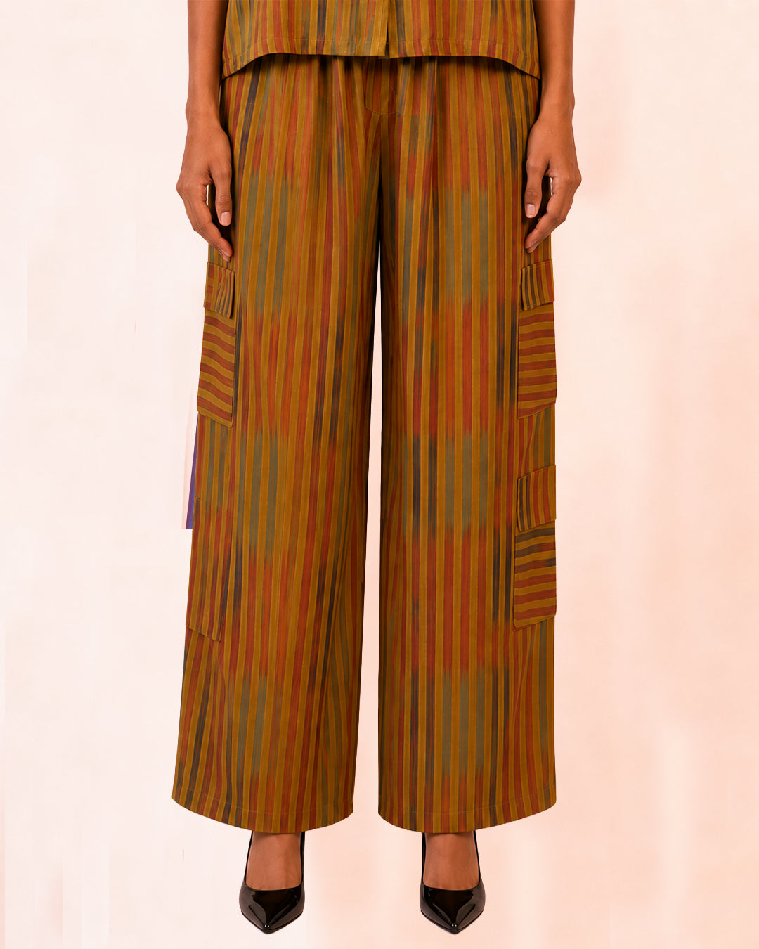 RAGA XII PANT SET is our one of a kind printed silk shirt and pant set, handcrafted by skilled artisans in house using a vintage silk saree. 