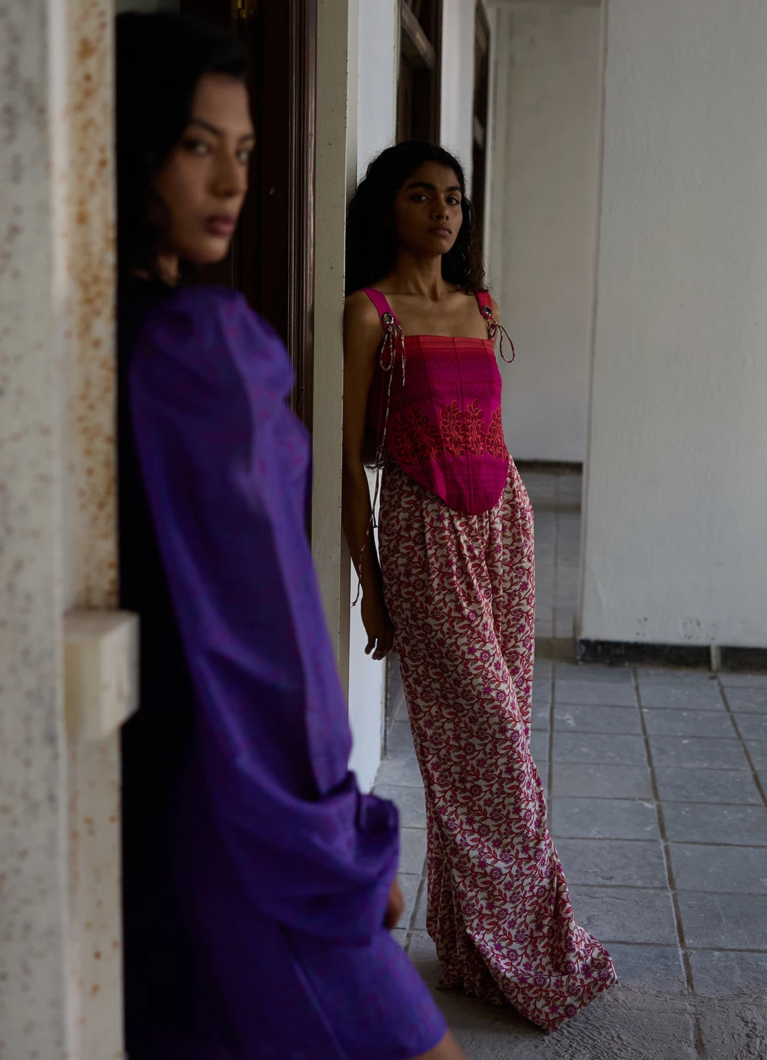 RAYA is our one-of-a-kind printed silk corset with delicate shoulder straps, handcrafted by skilled artisans in-house using a vintage silk saree. 